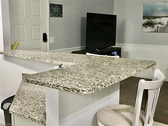 5th image of 8021 S Woods Cir Unit 3