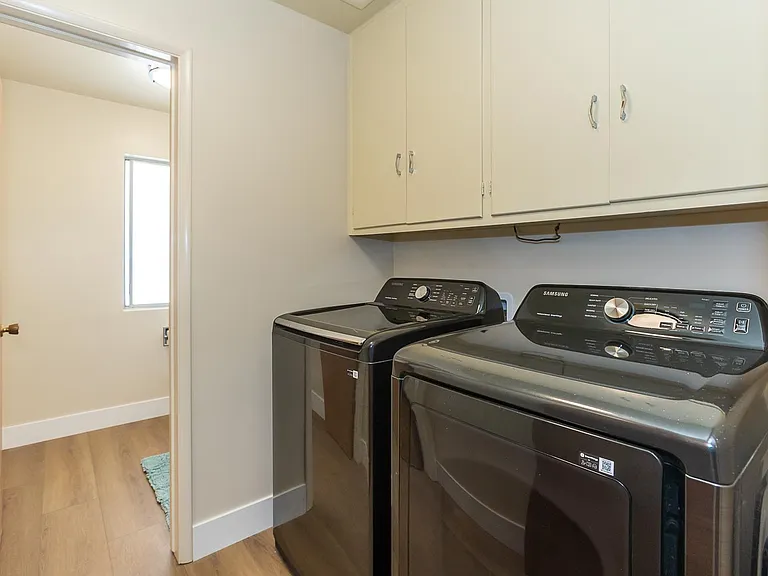 Laundry room with new washer/dryer