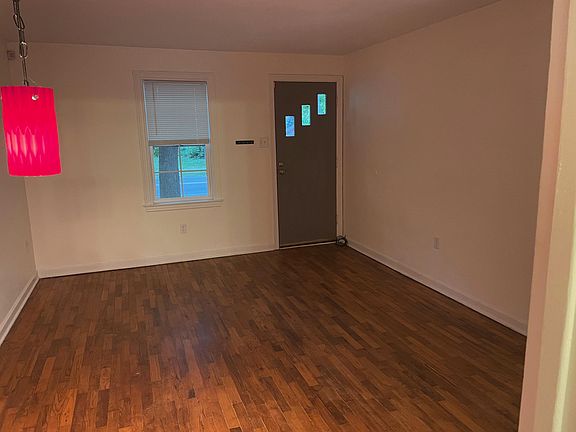 Living room pictured from kitchen door.