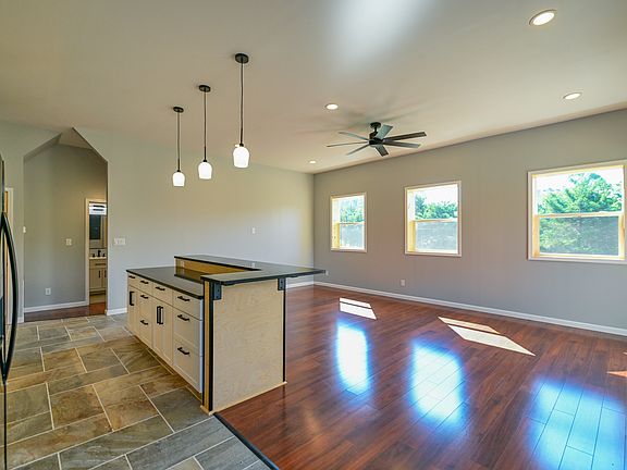 This space is a cooking/dining/living room area.