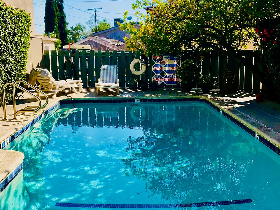 Private Fenced Pool in center of building courtyard.