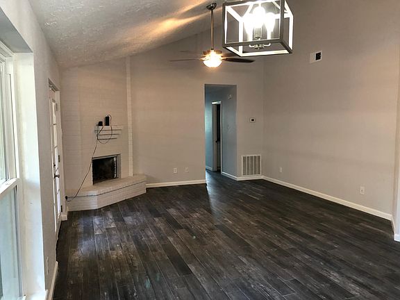 Living Area with wood burning fireplace