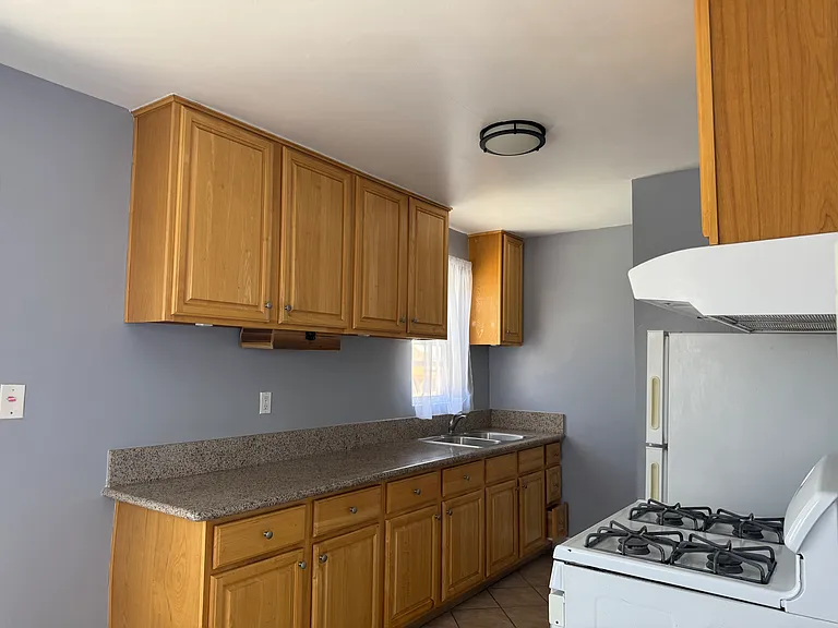 Kitchen with refrigator