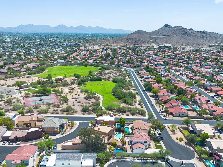Lookout Mountain Park is adjacent to the community with tennis courts, hiking, volleyball, two playgrounds with equipment including swings, slides, and climbing apparatus.