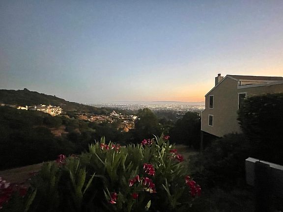 View of the homes exterior at sunset