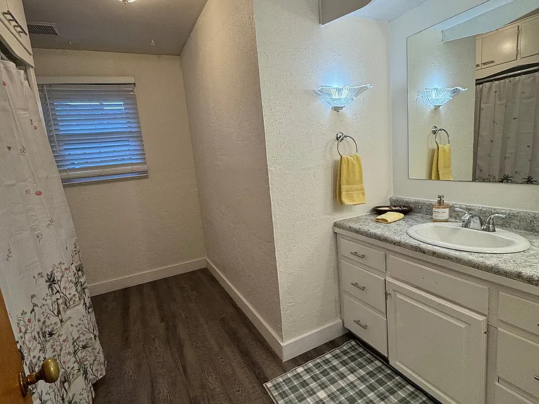 Hall bath has tub/shower