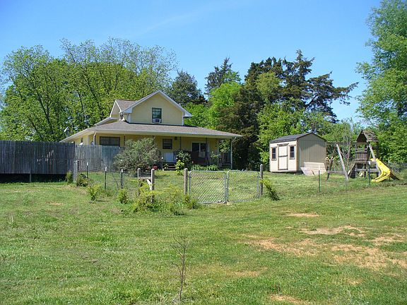 Fenced back yard/play area