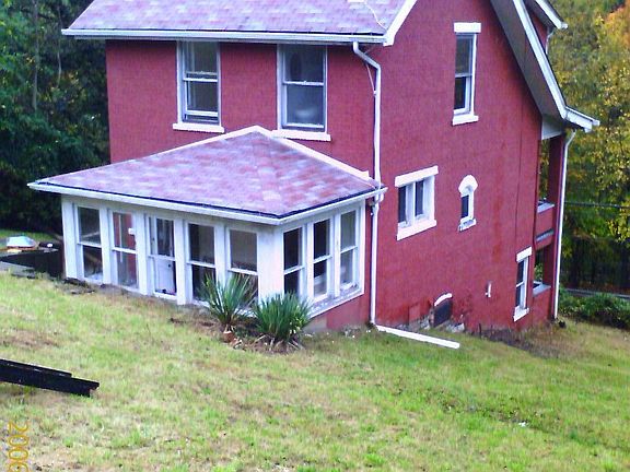The back yard showing the sun room