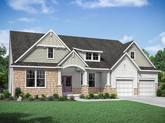 custom home with stone, siding and shakes