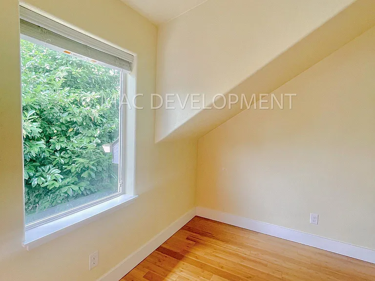 Living area to the left of the front door with large window