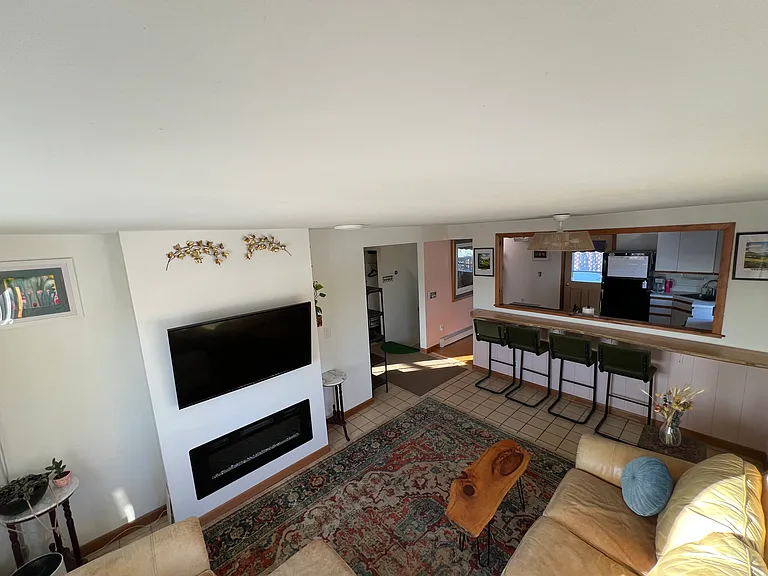 Living Room - with wall mounted TV and electric fireplace