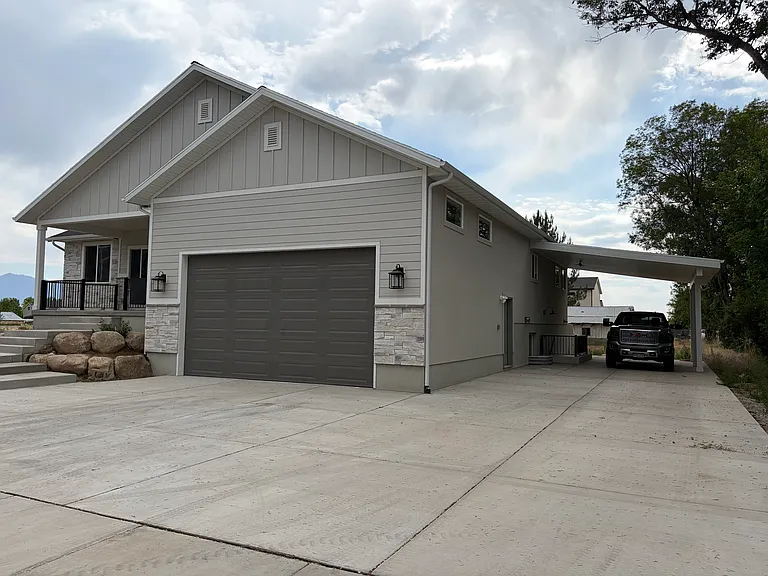 Large 2 car garage. NOTE: covered side parking is for basement tenants only.