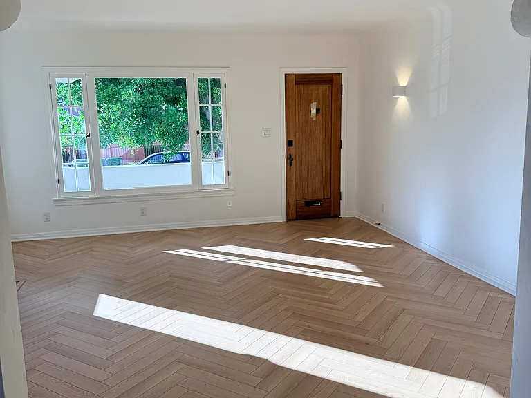 new high end Herringbone flooring throughout