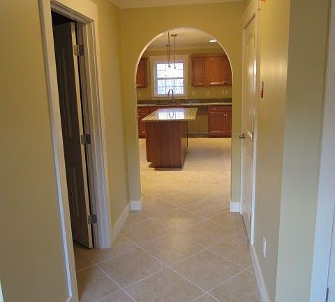 Hallway from entryway to kitchen