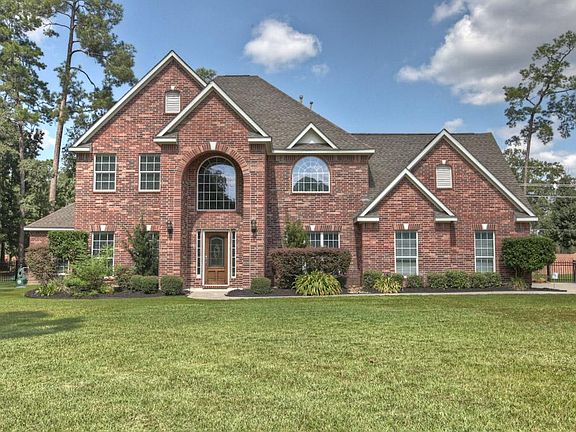 Lovely traditional home situated among the trees at the end of a long cul-de-sac.