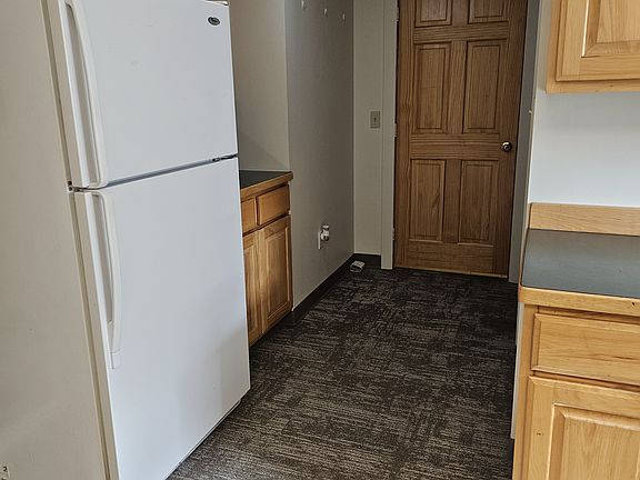 Kitchen & entry. Clean bright, freshly painted.