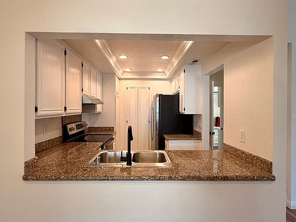 Kitchen with new appliances/fixtures