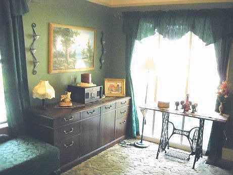 Another view of Library/Living Room showing picture window on front