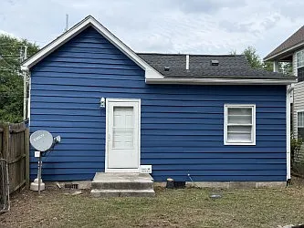 Back of the house from the fenced in yard.