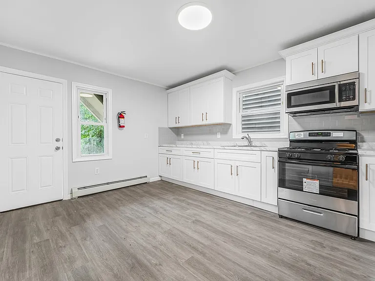 Kitchen and rear entrance.