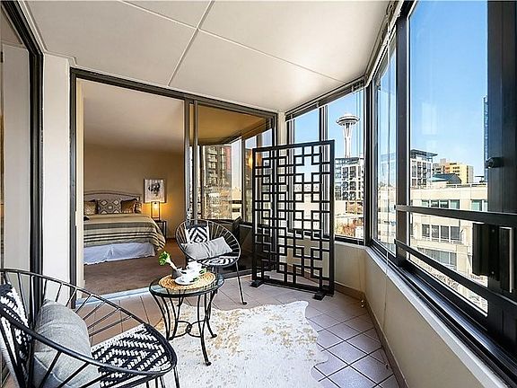 Enclosed patio, enjoy with large windows open or closed. Great space to entertain from or home office.