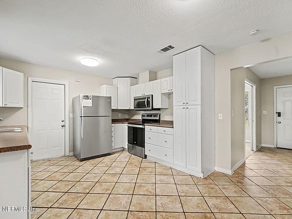 4th image of 8232 FROST Street N