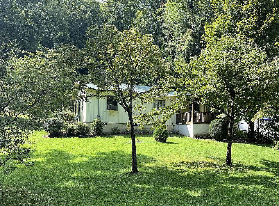 House sits high, above creek
