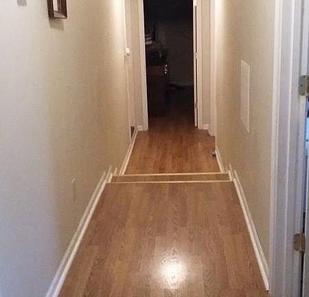 Hallway to bedrooms and garage