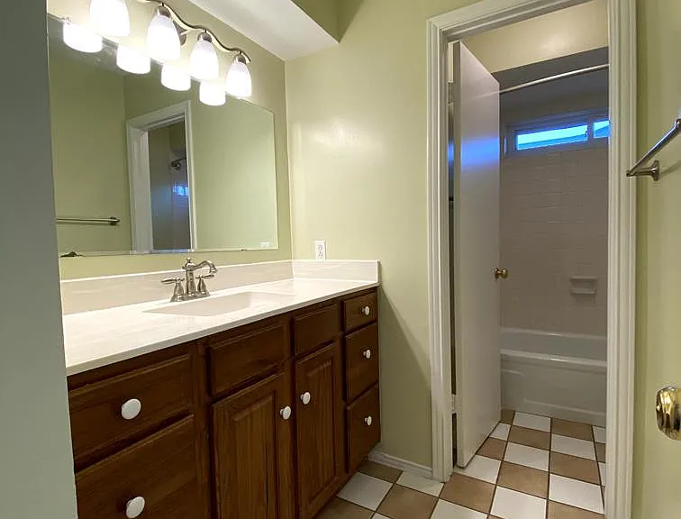 2nd bathroom has a tub/shower room and a sink room