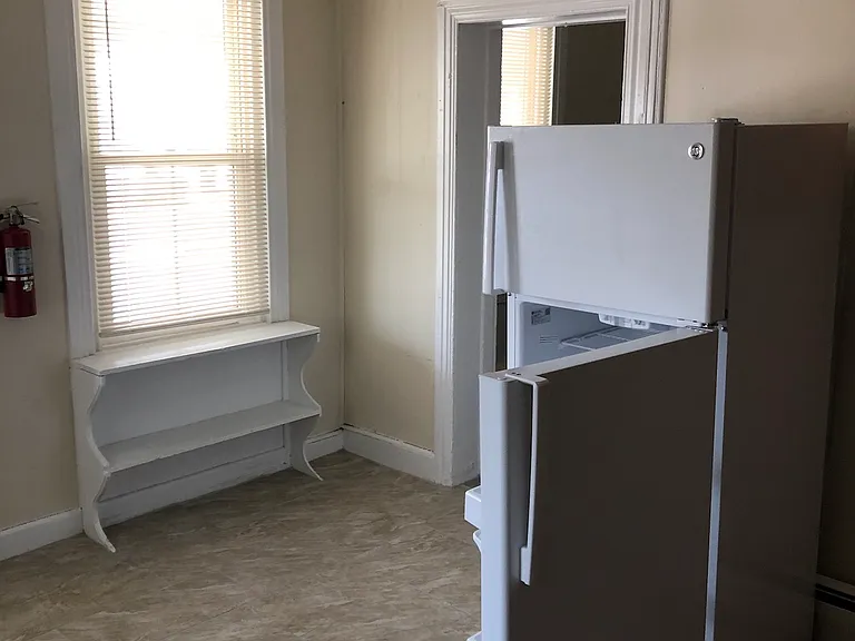 Kitchen with included fridge