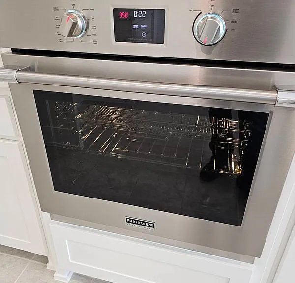 Kitchen view of stainless steel oven