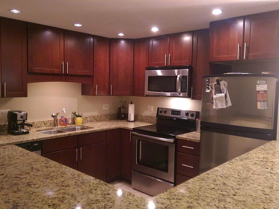 Cherry cabinets, granite countertops
