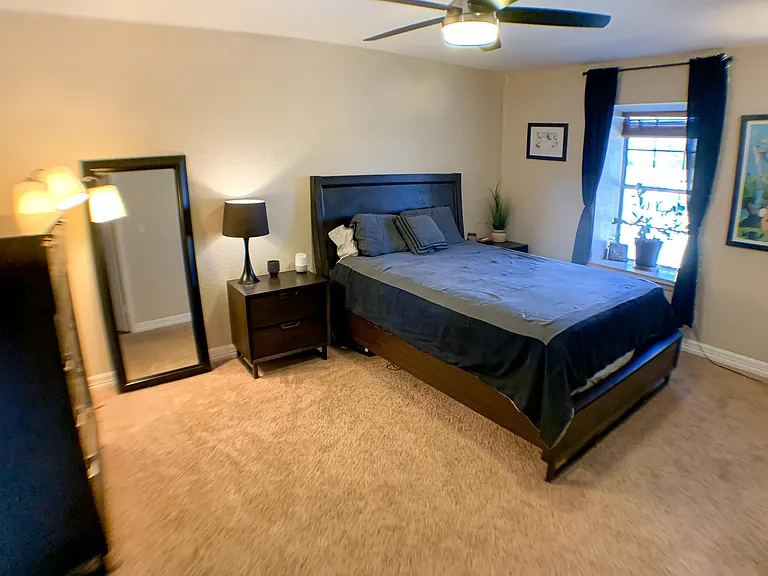 HUGE primary bedroom w/ window nook.