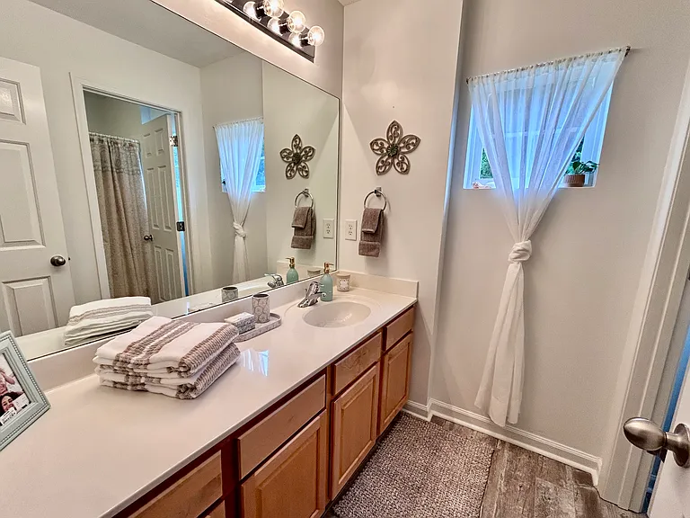 Upstairs bathroom with shower/tub.