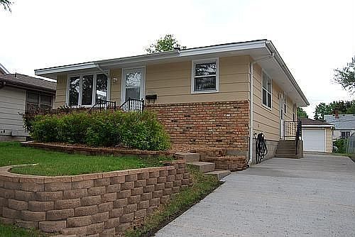 Nicely landscaped, exterior painted, new concrete driveway.
