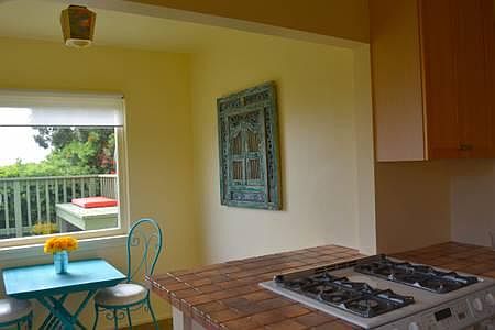 view from kitchen nook to elevated deck