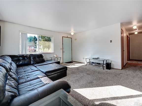 Down the hall are three bedrooms and one bath. 