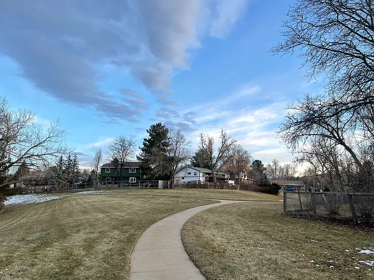 Greenbelts surround and define this community of homes. This is the greenbelt directly behind the home (with a similar view from the Upstairs Queen Bedroom with private bathroom). Great for kids, bikes, walks, etc. Wonderful, spacious feeling here.