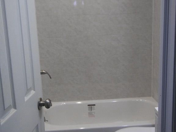 Brand new ultra modern tile bathroom 