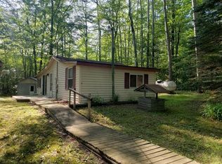 557 Circle Dr, Harrison, MI 48625