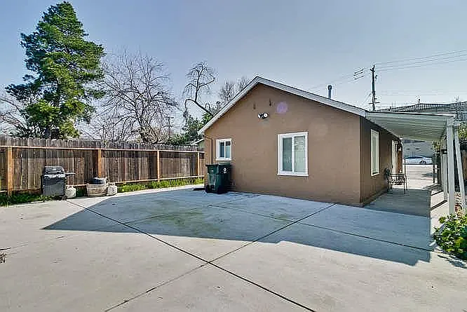Private fenced backyard w/ additional storage.