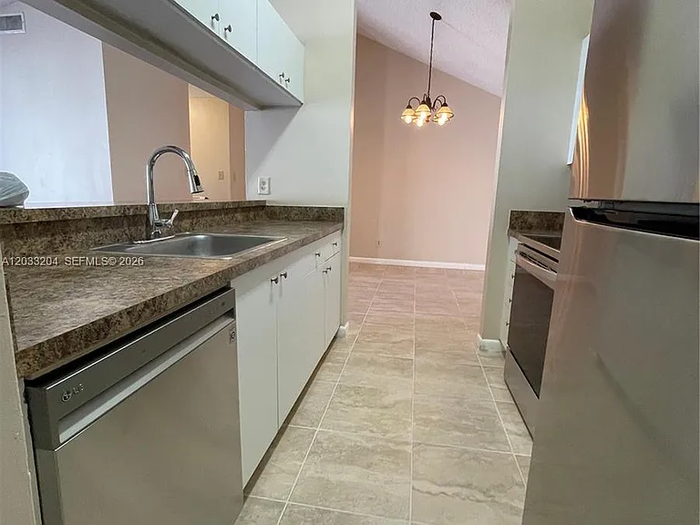 10521 SW 158th Ct #304 — Photo 27