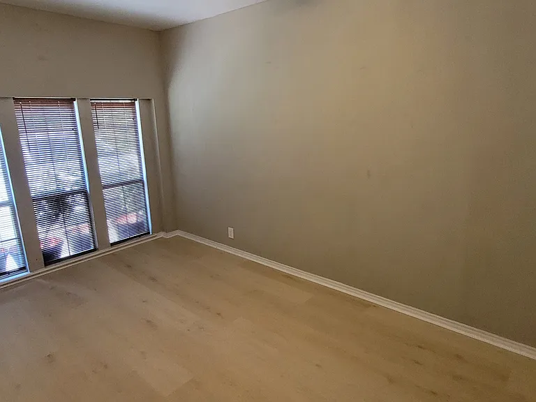 Picture bedroom (Rm #3). Has a ceiling fan. Walk-in closet to the right. Still being painted, so waiting until painted to post pics of closet.
