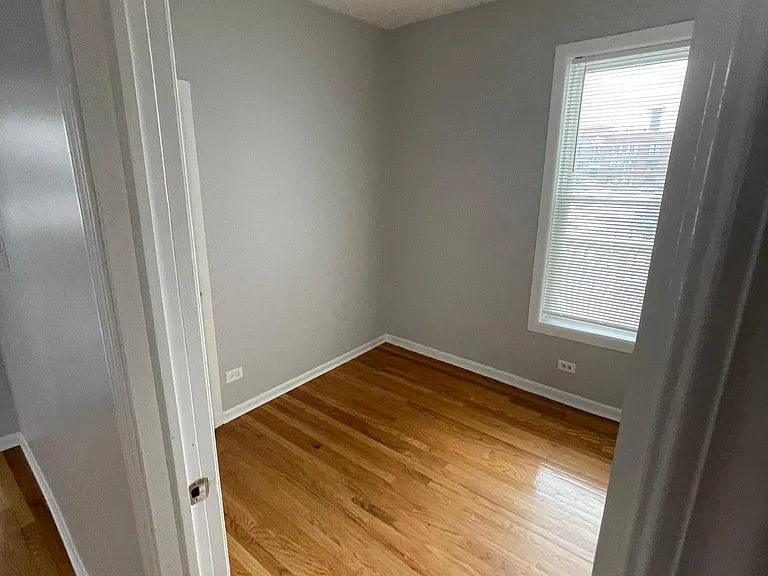 Bedroom 1, hardwood flooring