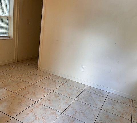First separate room , newly painted with two windows.
