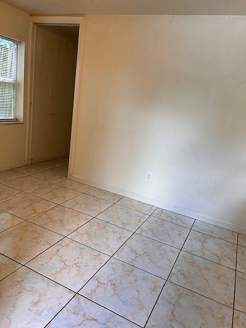 First separate room , newly painted with two windows.