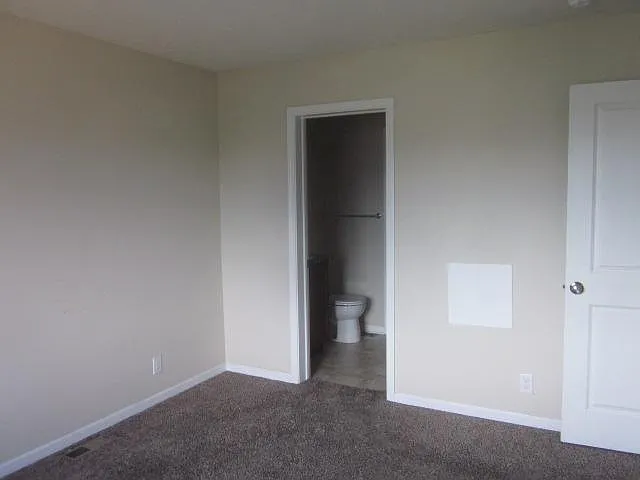 Primary Bedroom with Primary Bathroom