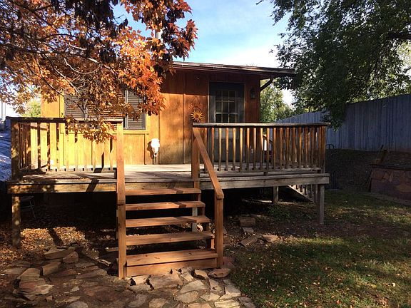 front entry with private deck[rock work has been finished.