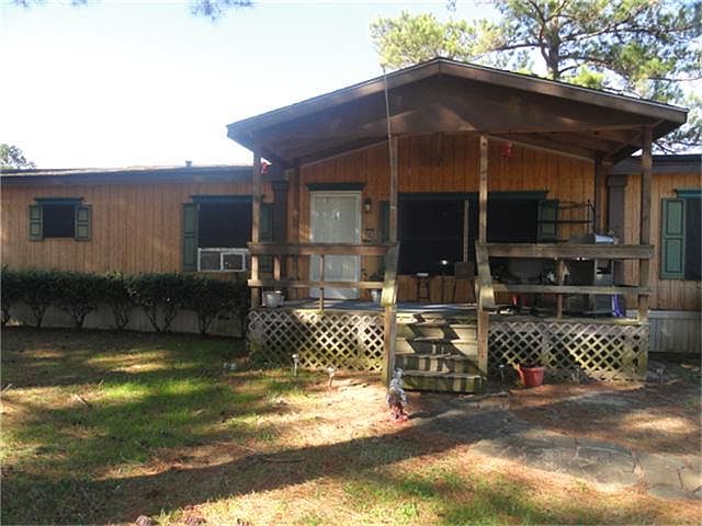 VIEW OF HOME WITH COVERED FRONT PORCH