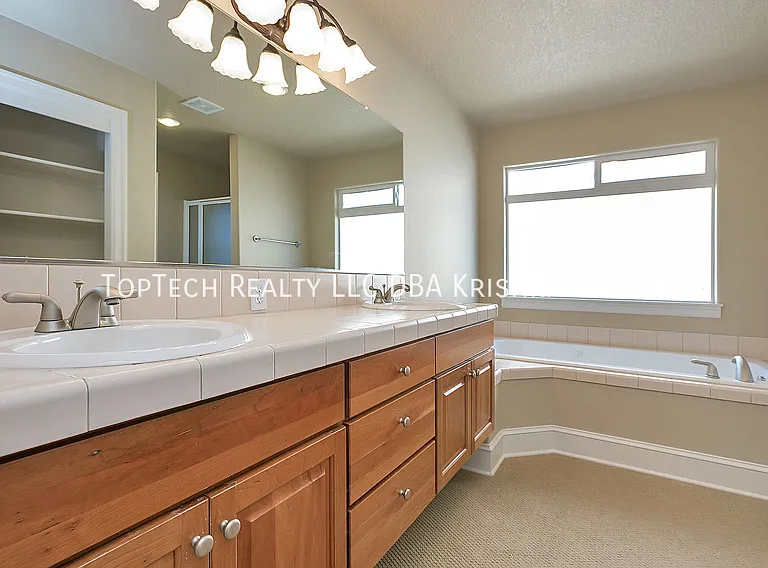 12649 NW Bayonne Ln — Photo 7